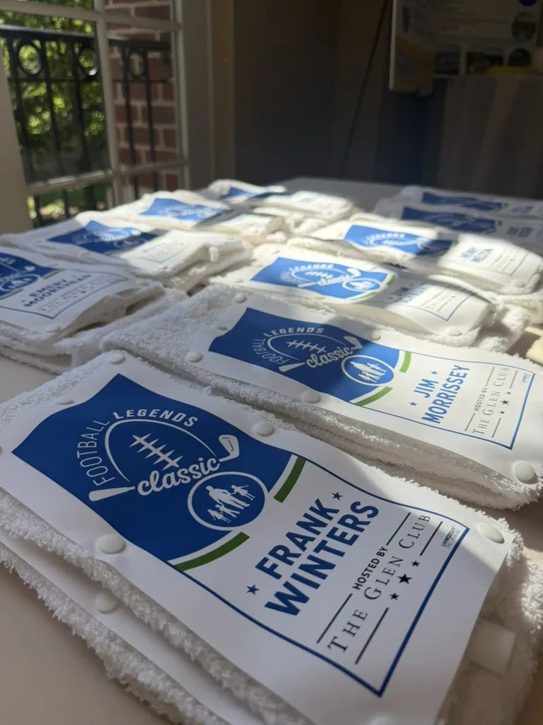 A table of towels with Football Legends Classic Skins, each with a player name